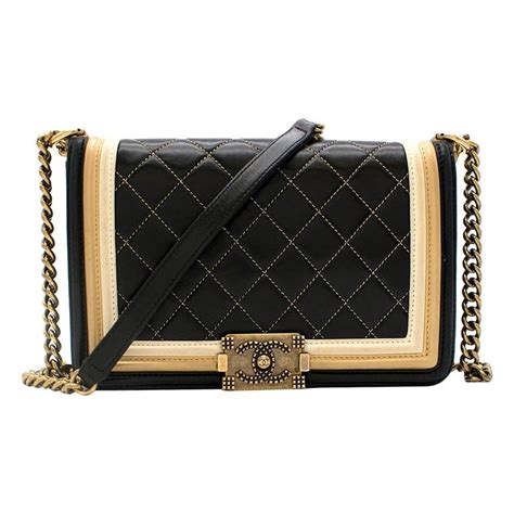 boy bag chanel black gold|Chanel black boyfriend bag.